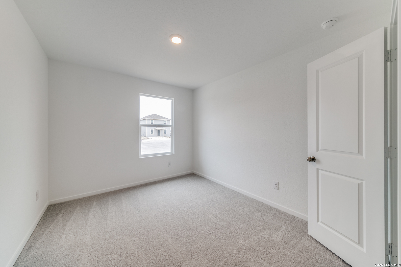 11621 Dog Rose Converse, TX 78109 - Photo 12 of 25 an empty room with a window