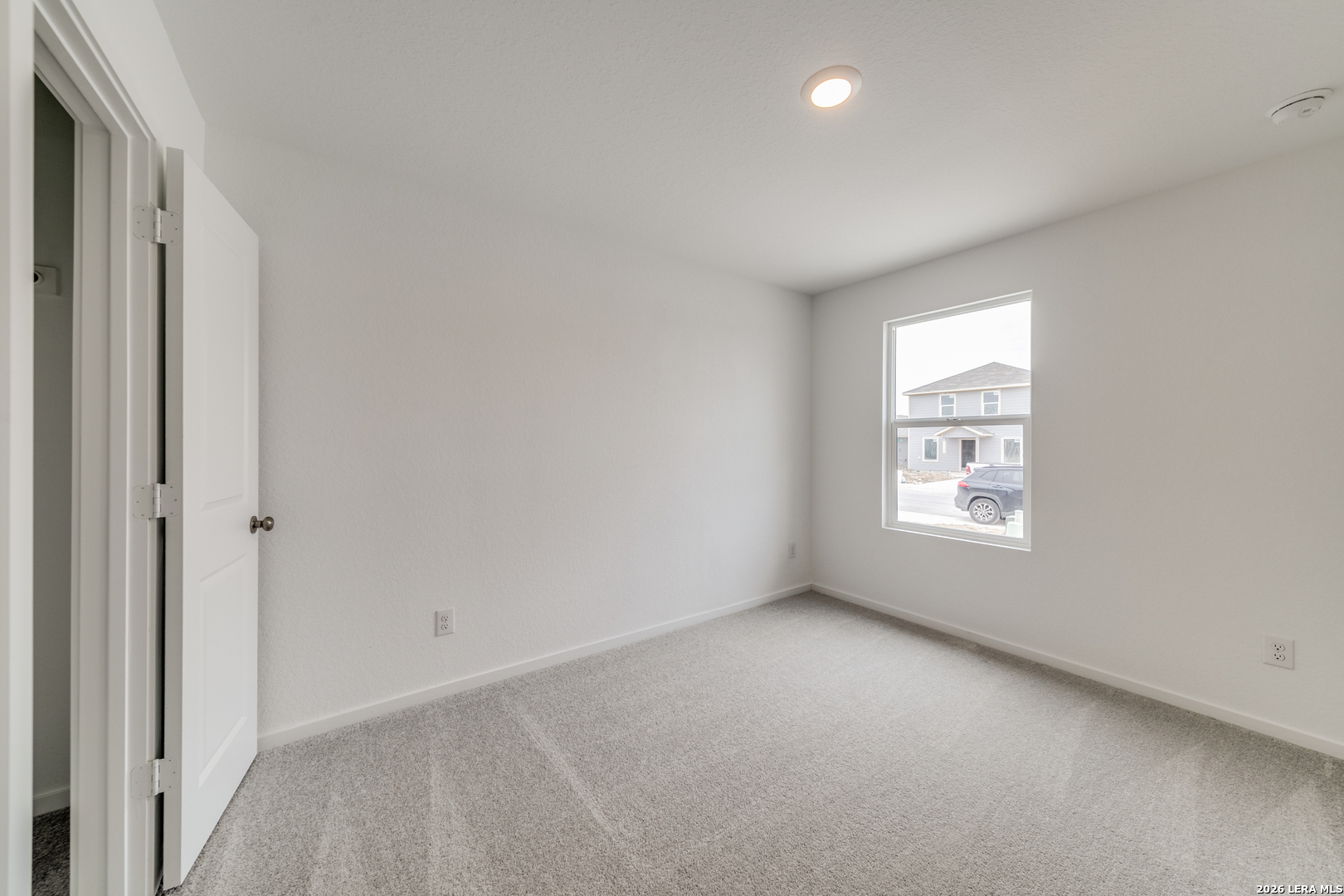 11621 Dog Rose Converse, TX 78109 - Photo 13 of 25 an empty room with a window