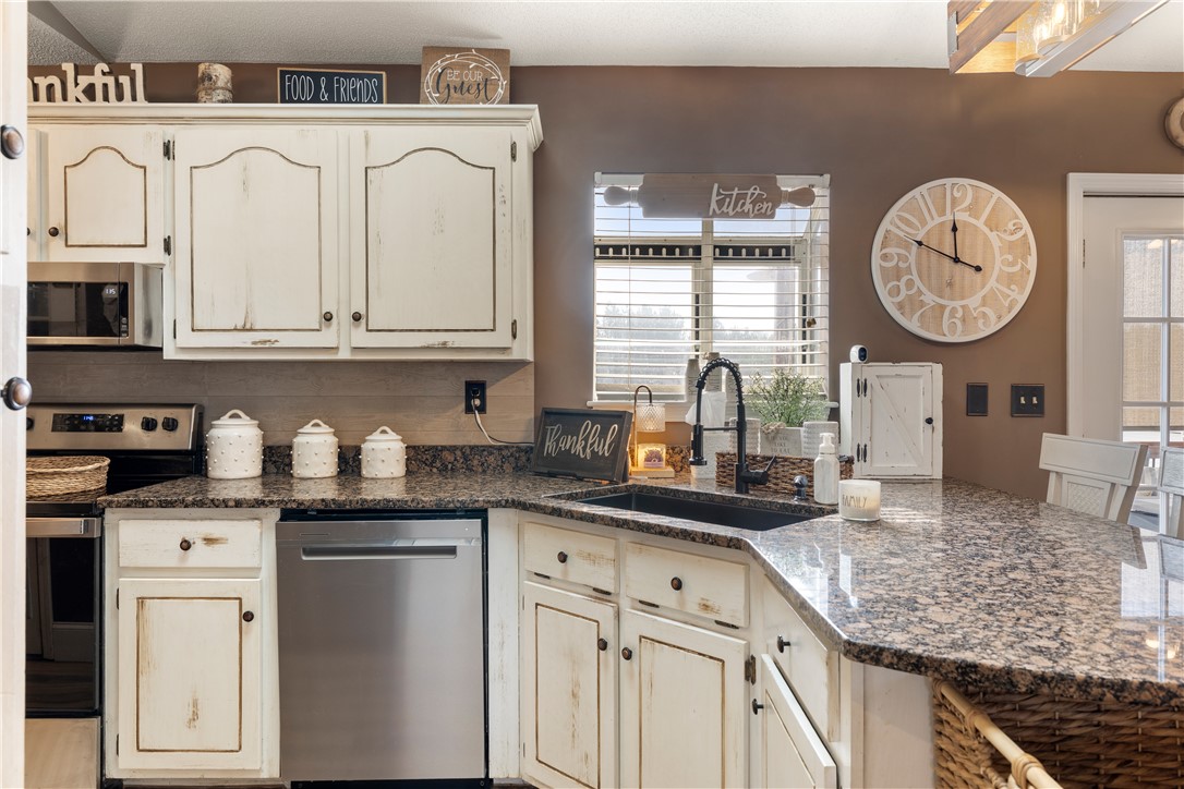 903 Huckleberry Lane Anderson, SC 29625 - Photo 13 of 42 This bright kitchen features ample counter space and appliances, perfect for daily living and entertaining.