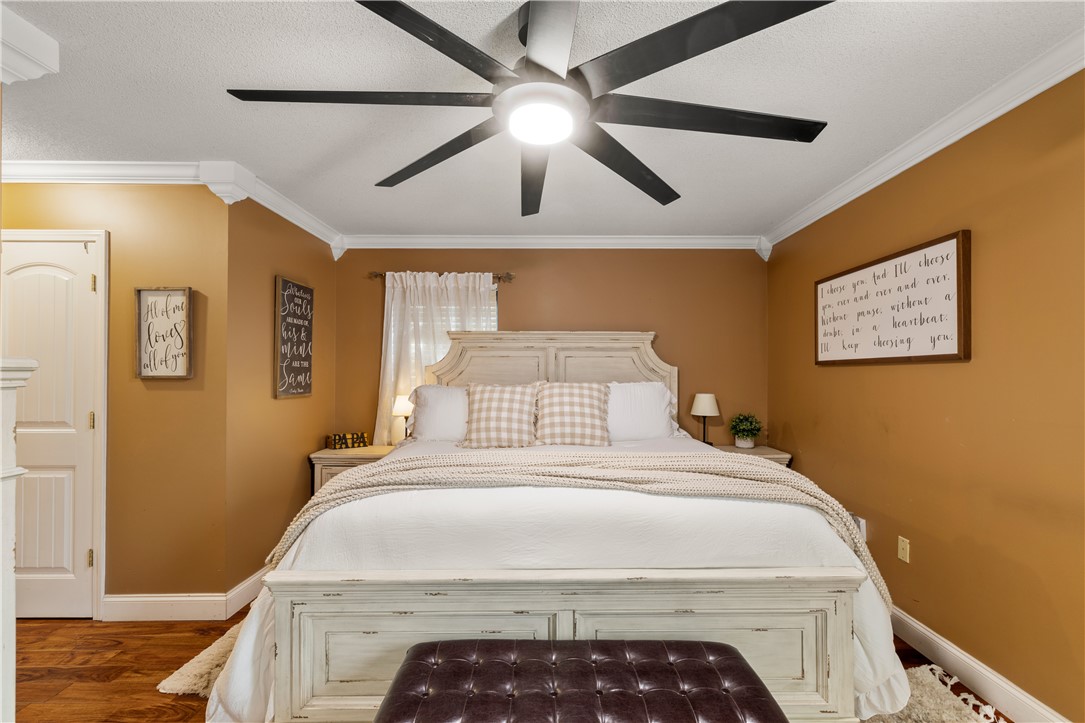 903 Huckleberry Lane Anderson, SC 29625 - Photo 24 of 42 This spacious sleeping quarter offers comfort with elegant details and ample natural light.