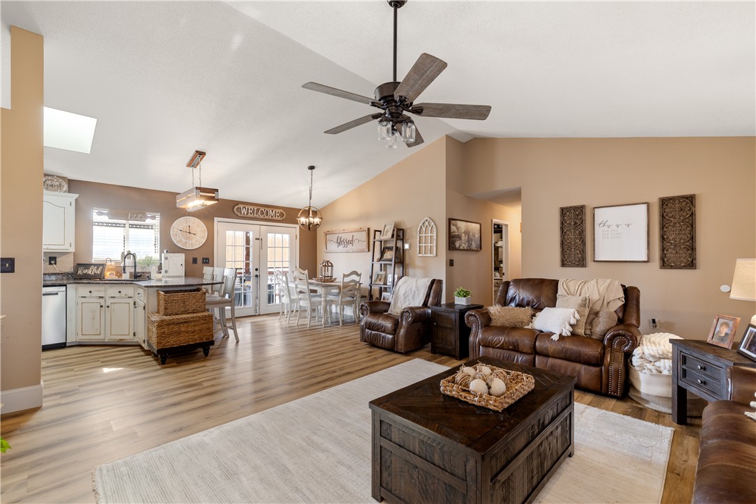 903 Huckleberry Lane Anderson, SC 29625 - Photo 9 of 42 An inviting open-concept space featuring a kitchen, dining area, and comfortable living room.