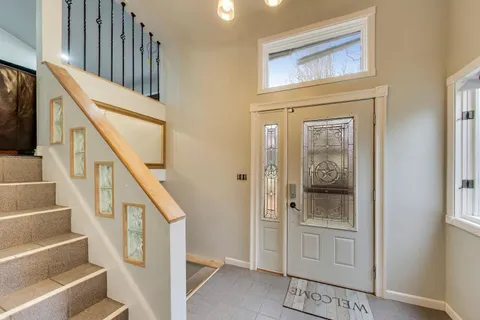 a view of an entryway with staircase