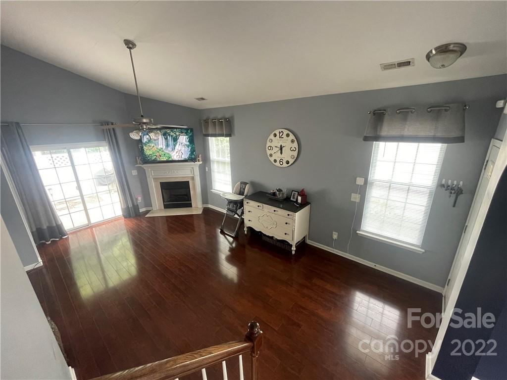 915 Copperstone Lane, Unit 189 Fort Mill, SC 29708 - Photo 5 of 15 a living room with furniture and a fireplace
