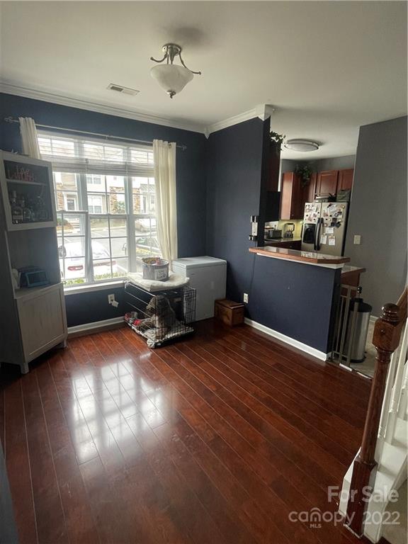 915 Copperstone Lane, Unit 189 Fort Mill, SC 29708 - Photo 6 of 15 a living room with furniture and a wooden floor