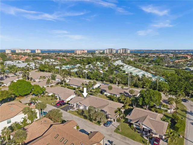 an aerial view of a city with lots of residential buildings