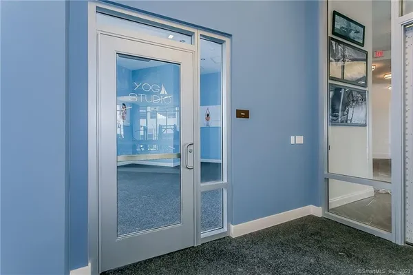 an empty room with mirror