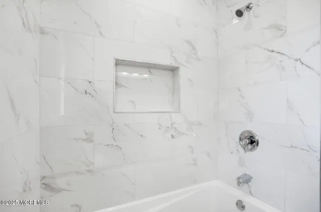 a bathroom with a bathtub