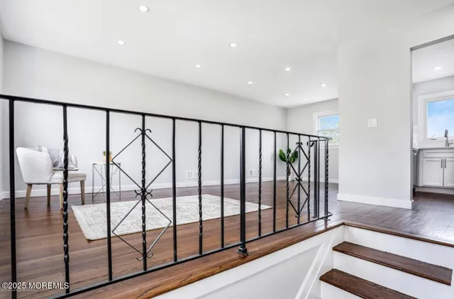 a view of entryway with stairs