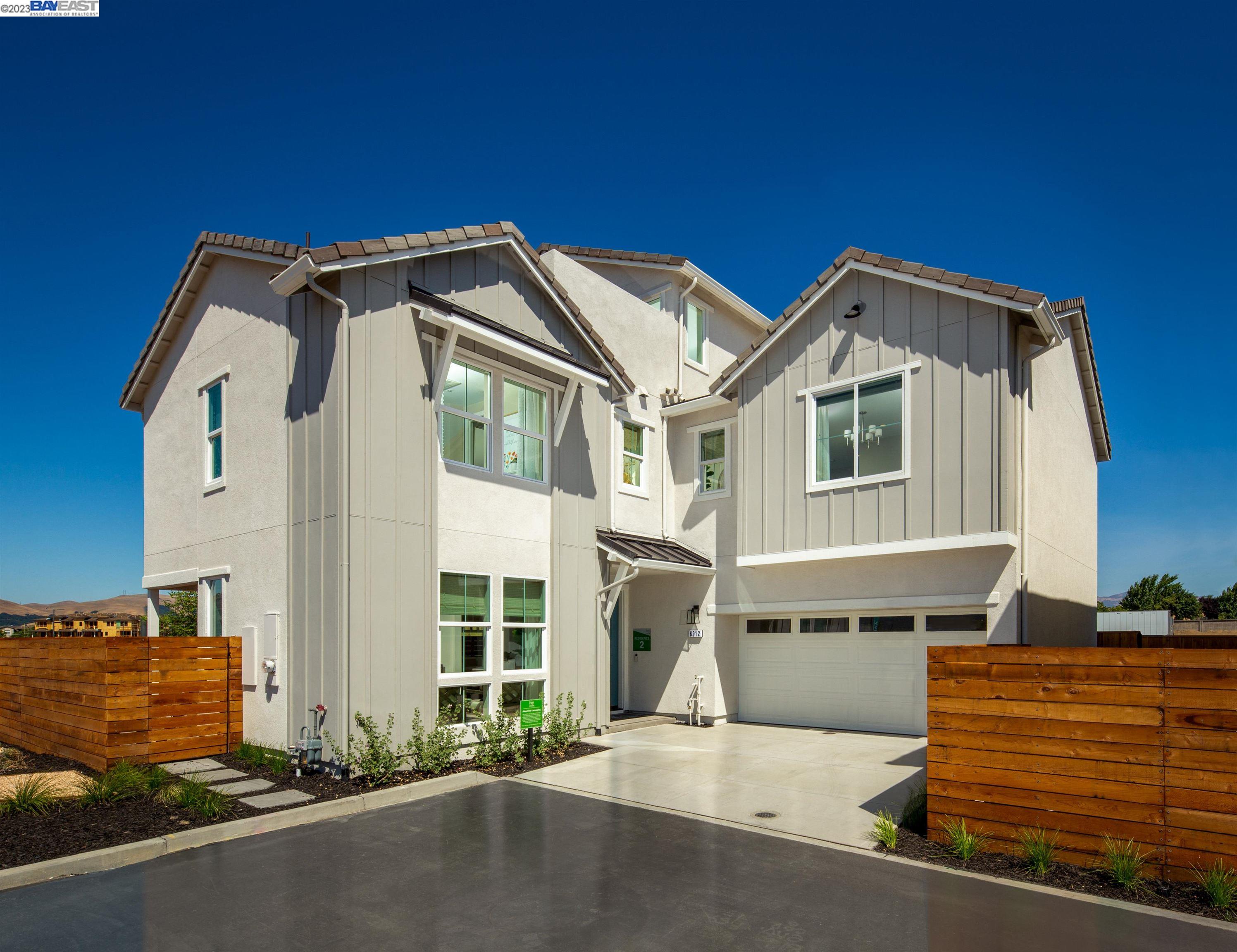 6171 Diamond Way Dublin, CA 94568 - Photo 1 of 1 a front view of a house with a garage