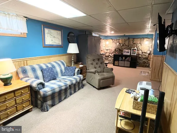 a living room with furniture and a couch