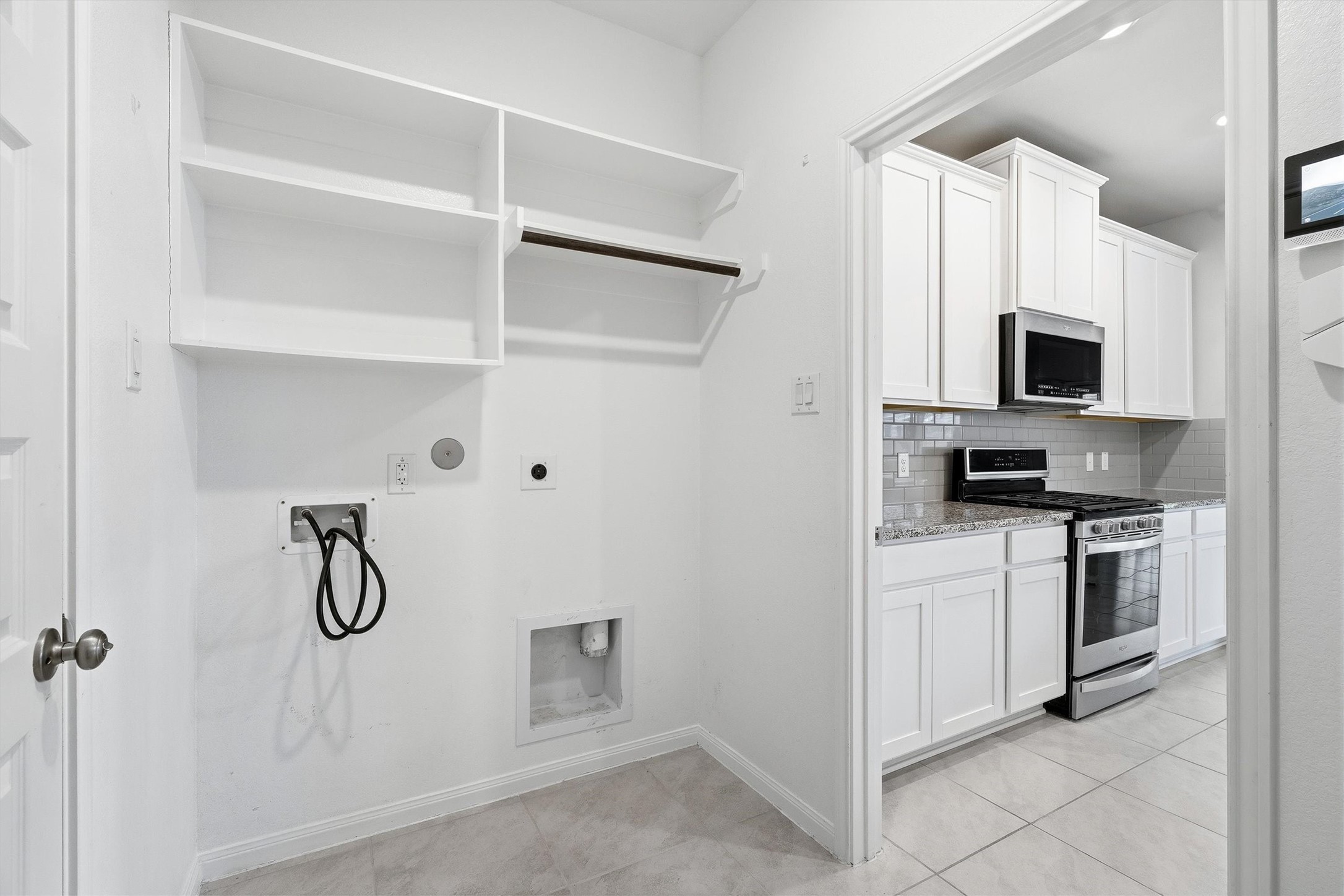 2413 Olancha Drive Rosharon, TX 77583 - Photo 23 of 41 Laundry area conveniently close to the kitchen area