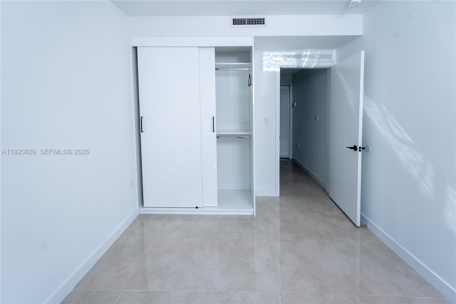 14580 Southwest 261st Street Homestead, FL 33032 - Photo 19 of 23 an empty room with closet