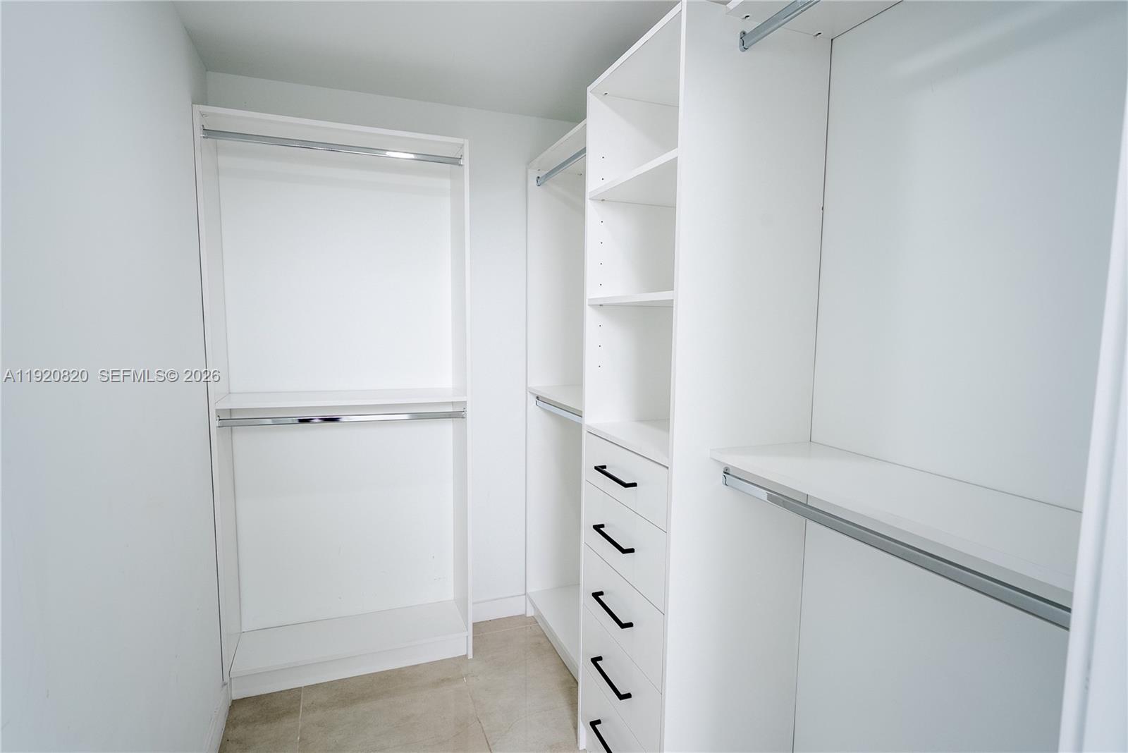 14580 Southwest 261st Street Homestead, FL 33032 - Photo 20 of 23 a view of walk in closet