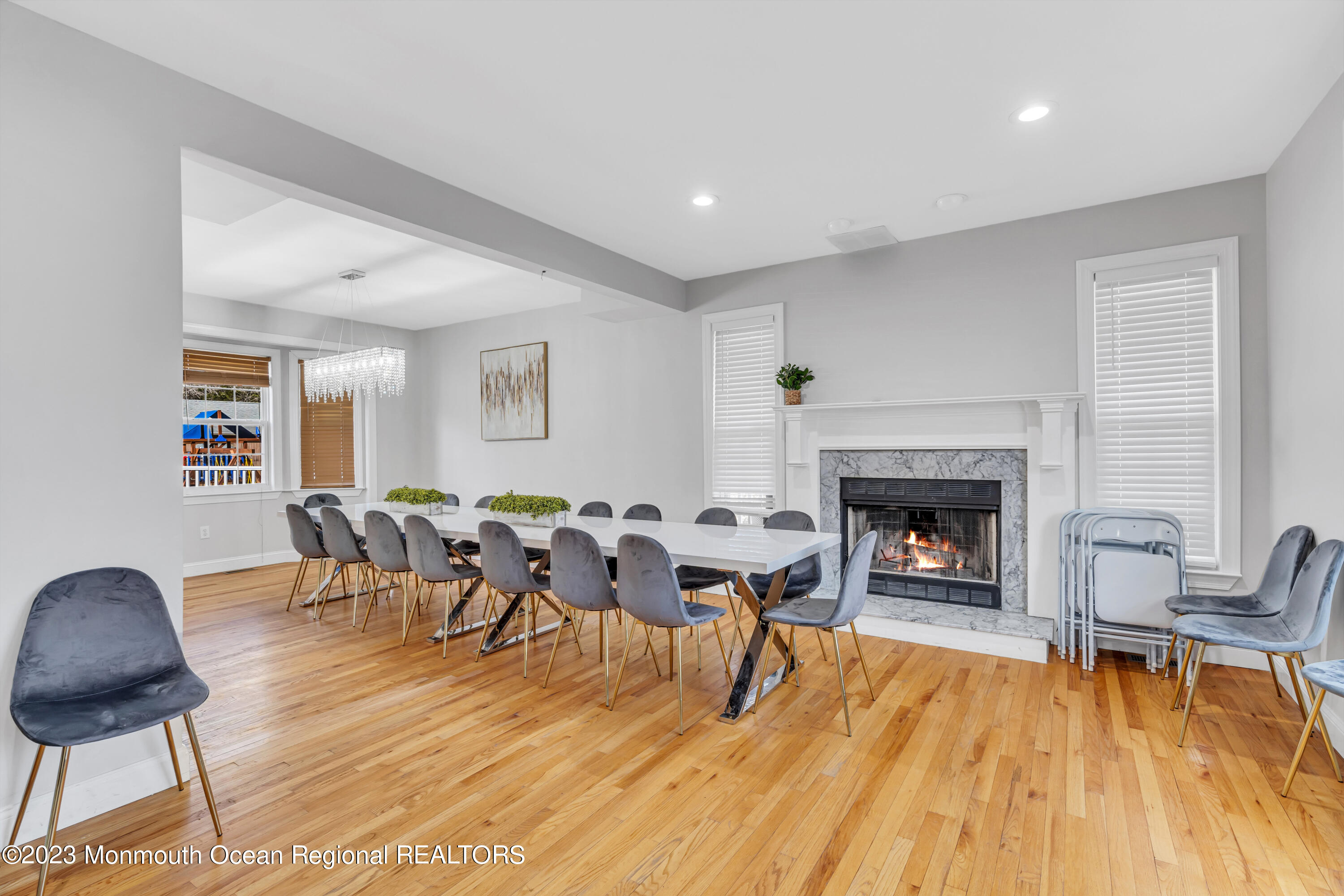 12 Clayton Road Howell, NJ 07731 - Photo 16 of 84 a living room with furniture and a fireplace