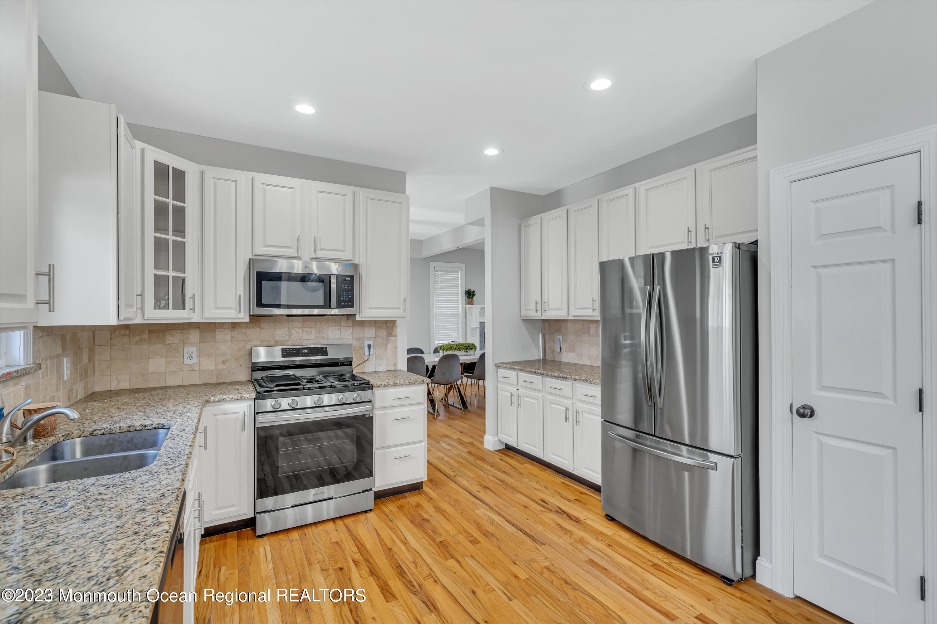 12 Clayton Road Howell, NJ 07731 - Photo 23 of 84 a kitchen with stainless steel appliances a refrigerator sink and microwave