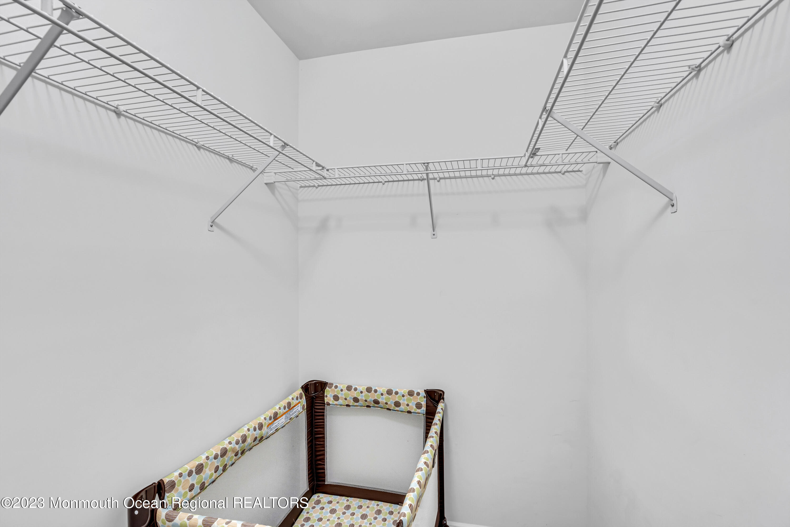 12 Clayton Road Howell, NJ 07731 - Photo 45 of 84 a view of a room with racks on the wall