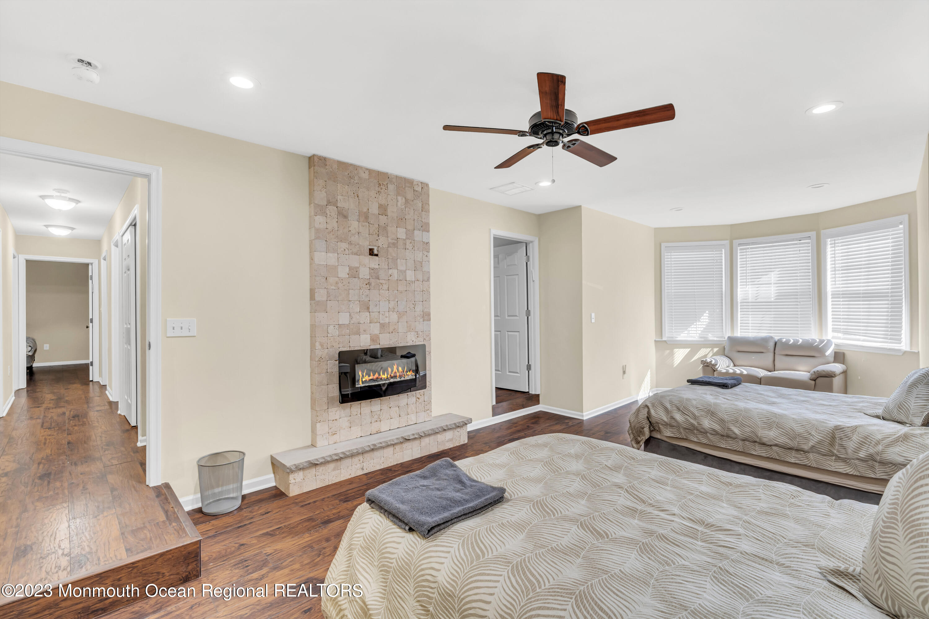 12 Clayton Road Howell, NJ 07731 - Photo 54 of 84 a bedroom with a bed and a couch