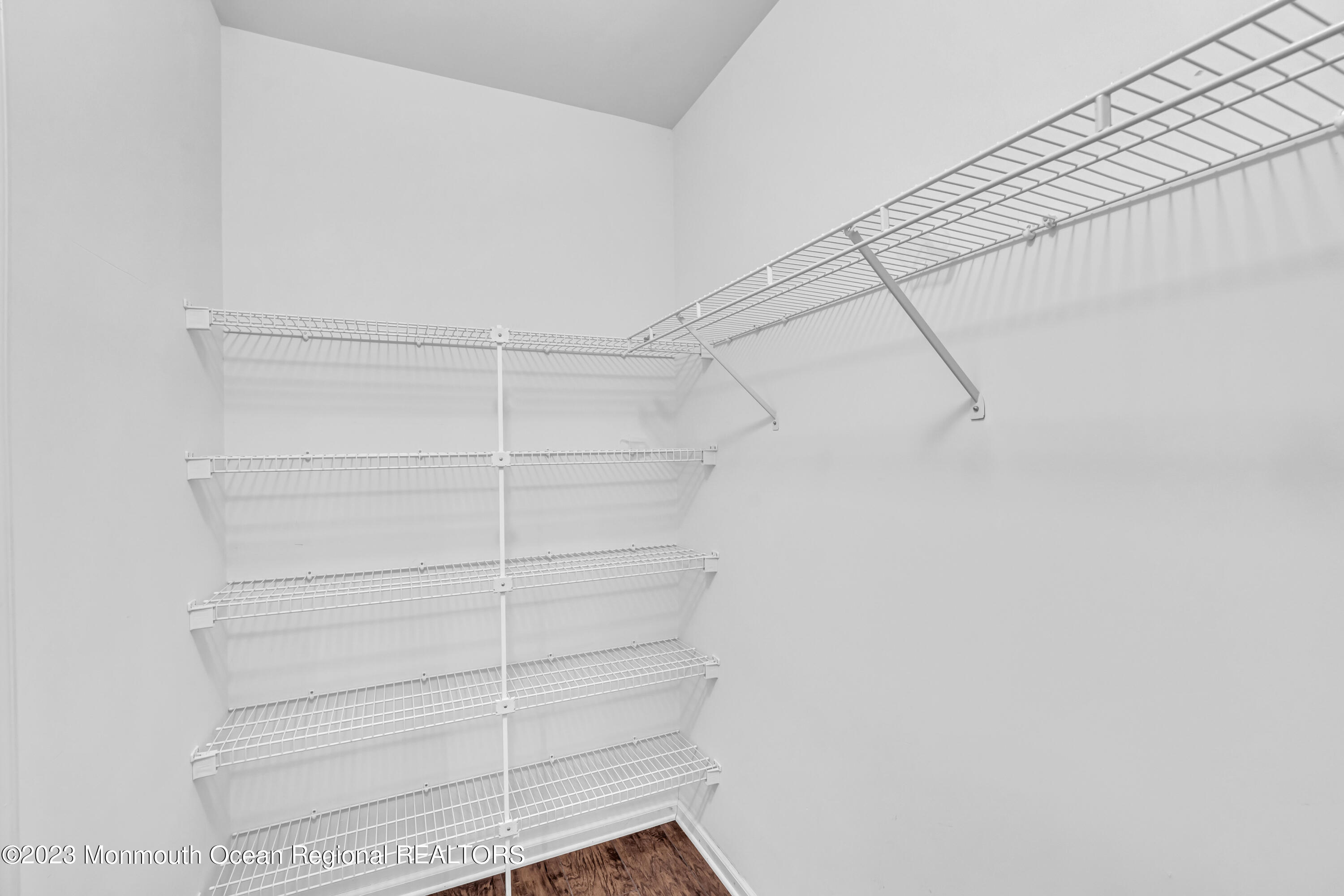 12 Clayton Road Howell, NJ 07731 - Photo 60 of 84 a view of a room with racks on the wall