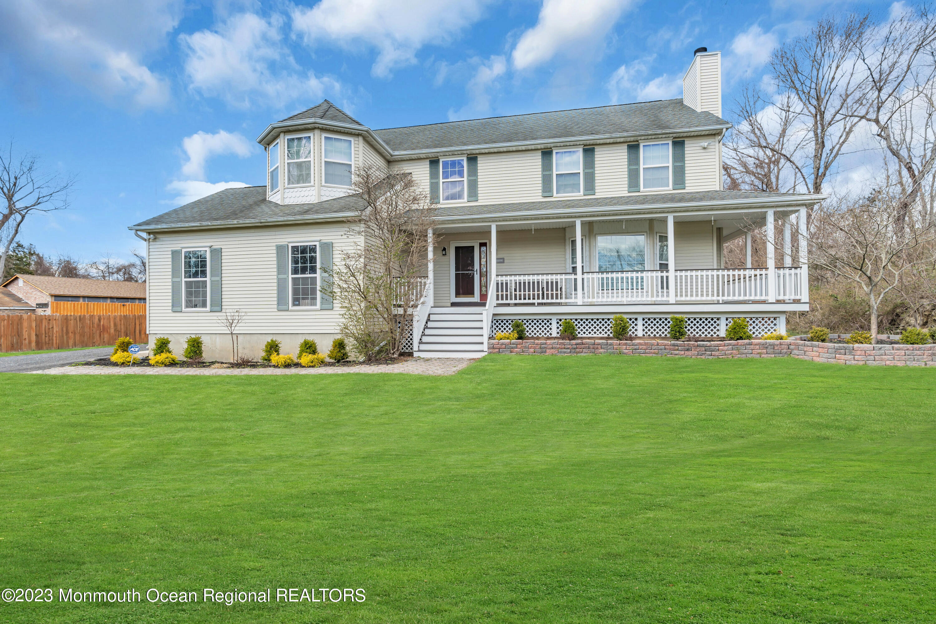 12 Clayton Road Howell, NJ 07731 - Photo 7 of 84 a front view of a house with a garden