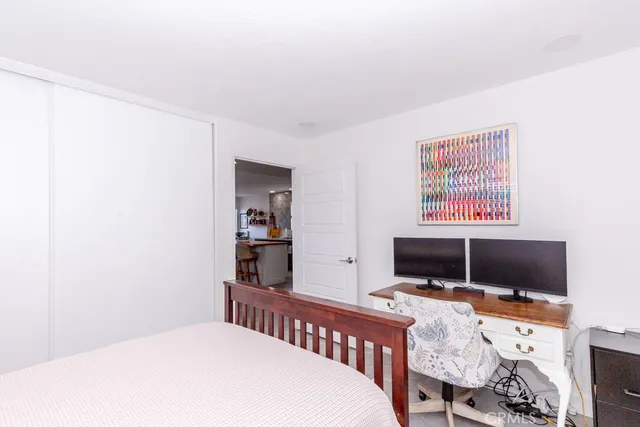a bathroom with a sink toilet and a mirror