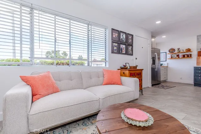 a view of small backyard with patio