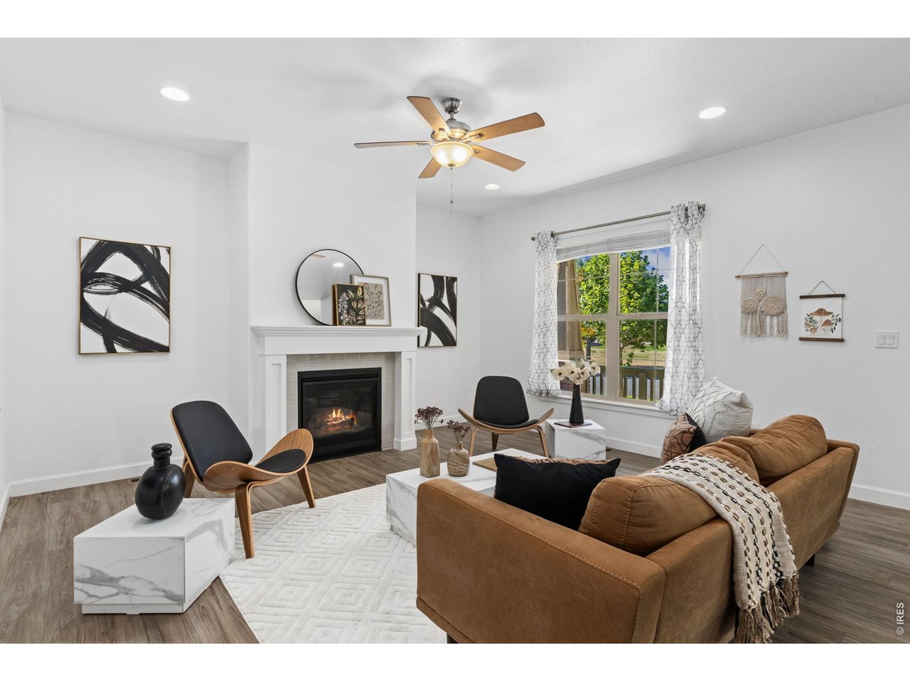 6511 19th Street Greeley, CO 80634 - Photo 4 of 26 Open Foorplan and Gas Fireplace Compliment this Space