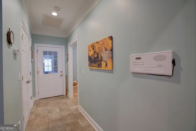 a bathroom with a glass shower door and a bathtub
