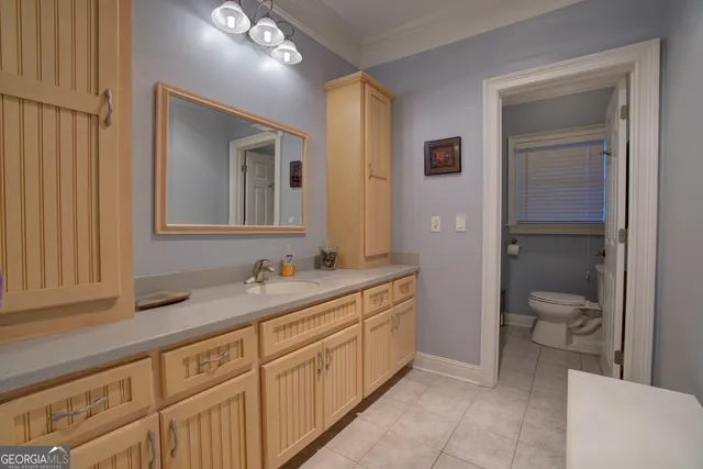 a view of a patio with a table and chairs
