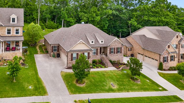 a aerial view of a house with garden