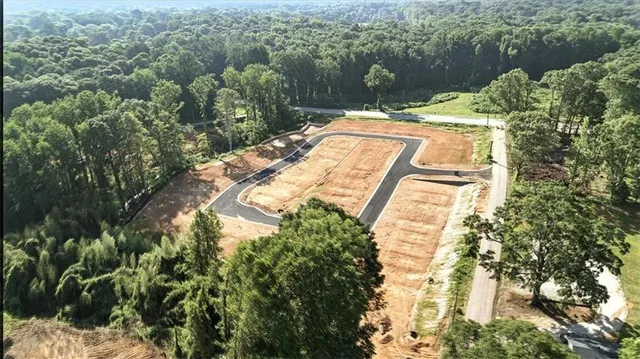 a view of backyard with swimming pool and outdoor space