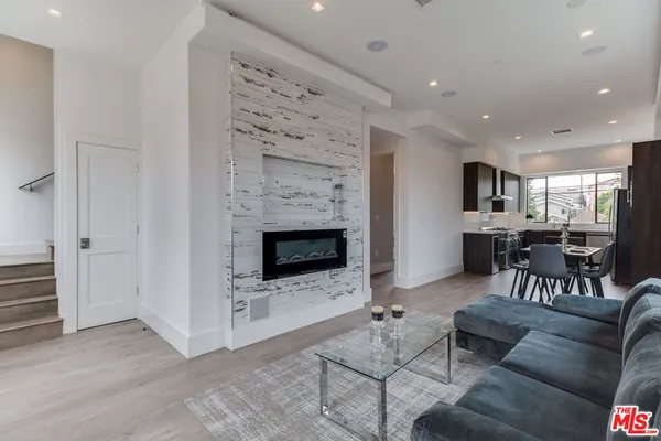 a bathroom with a sink toilet and vanity