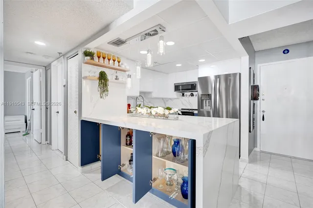 a view of an empty room with closet