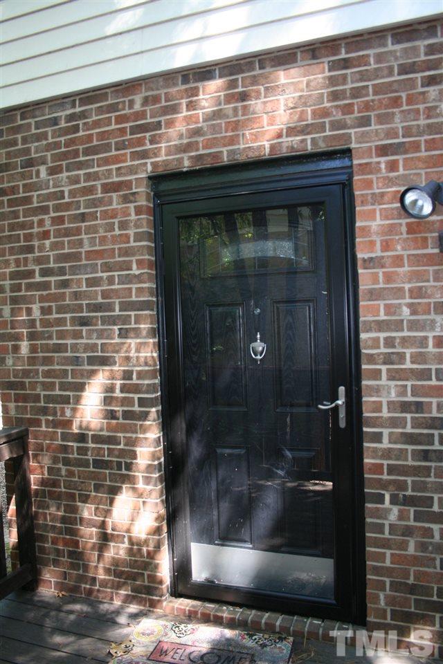 6507 New Market Way, Unit 6507 Raleigh, NC 27615 - Photo 3 of 13 New Storm Doors, Front and Back