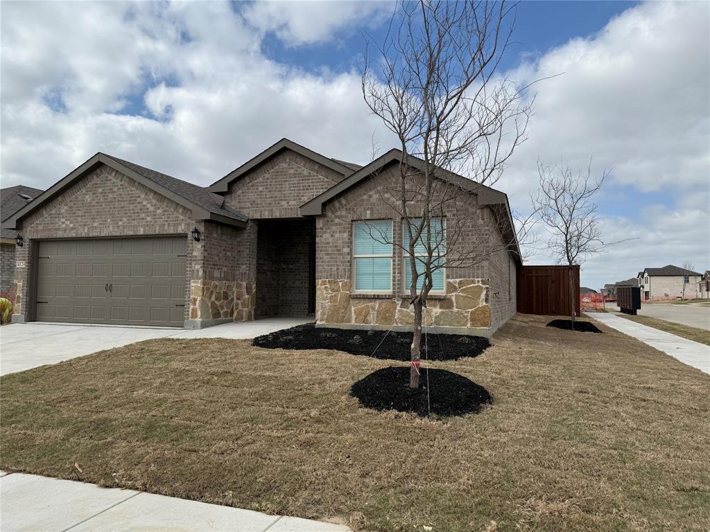 4124 Turquoise Avenue Celina, TX 75009 - Photo 2 of 17 a front view of a house with a yard