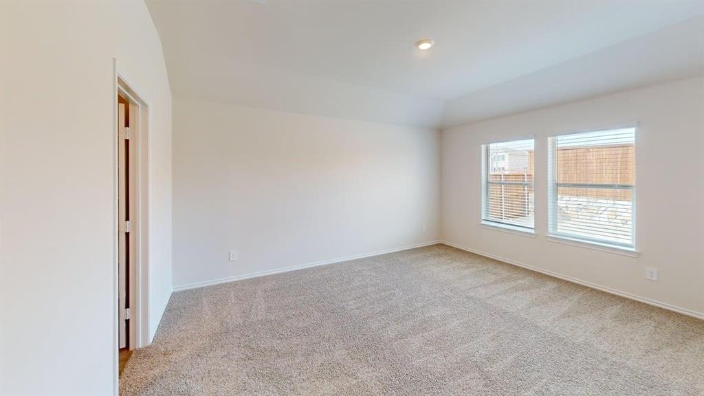 4124 Turquoise Avenue Celina, TX 75009 - Photo 9 of 17 an empty room with windows