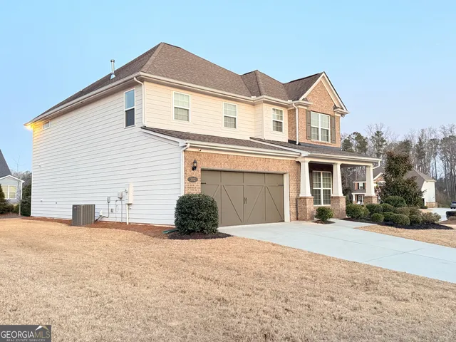 a view of a backyard of a house
