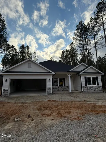a view of a backyard of a house