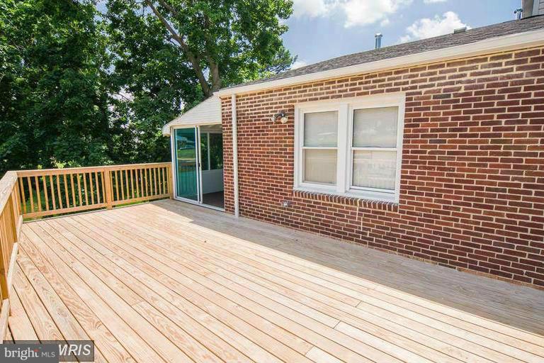 3323 Offutt Road Randallstown, MD 21133 - Photo 22 of 23 a view of a wooden deck