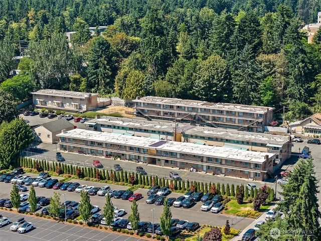 an aerial view of a building with garden and entertaining space