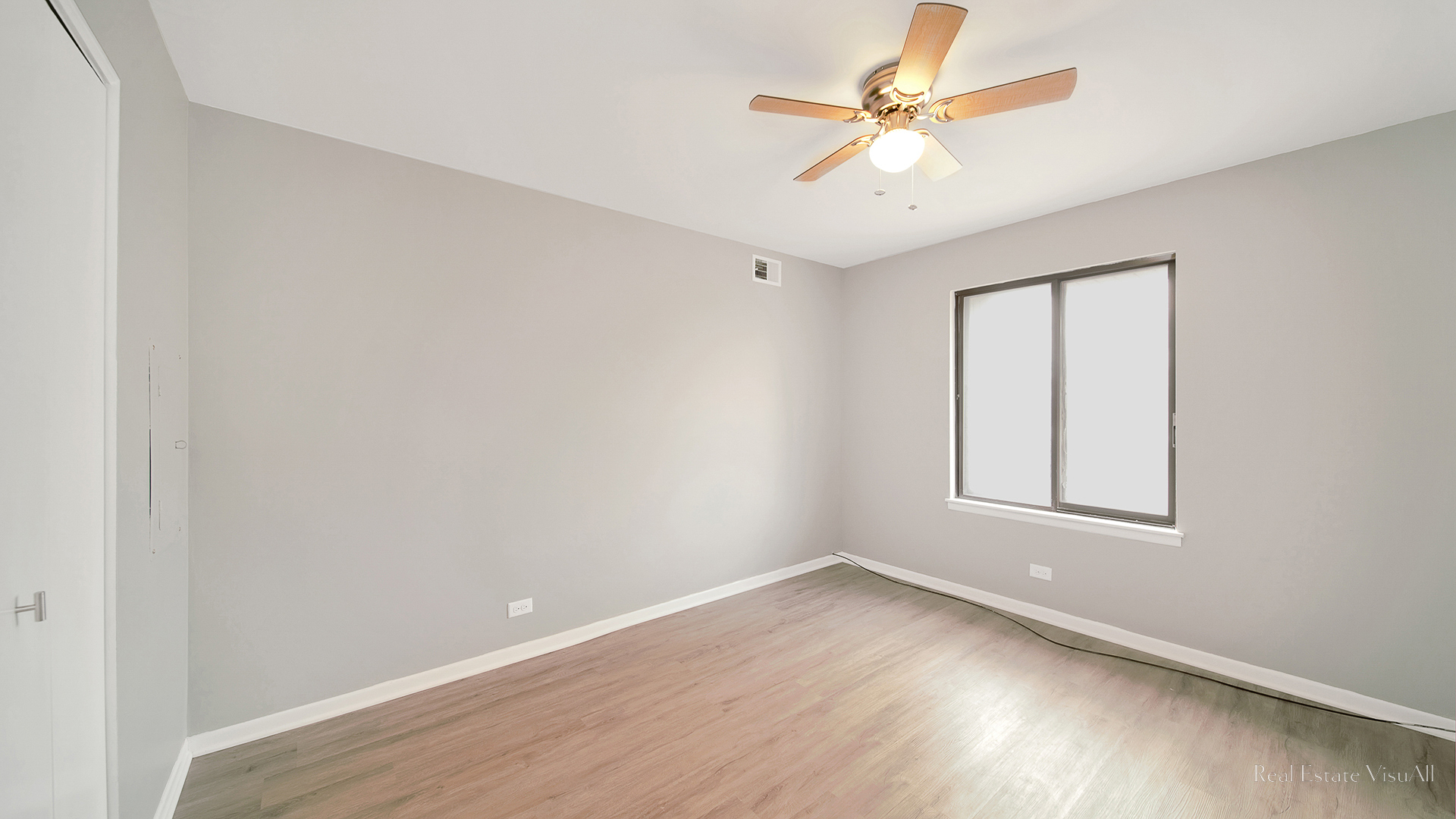 840 Elder Road, Unit A405 Homewood, IL 60430 - Photo 13 of 21 an empty room with wooden floor and windows