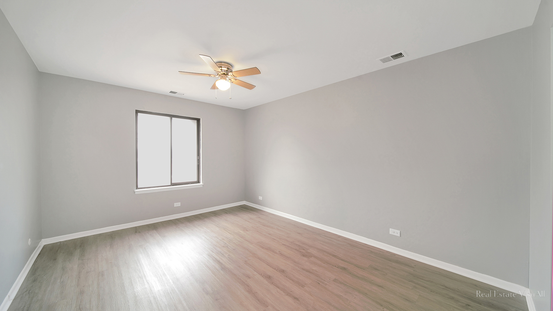 840 Elder Road, Unit A405 Homewood, IL 60430 - Photo 14 of 21 an empty room with wooden floor ceiling fan and windows