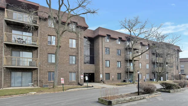 a view of a building with a street
