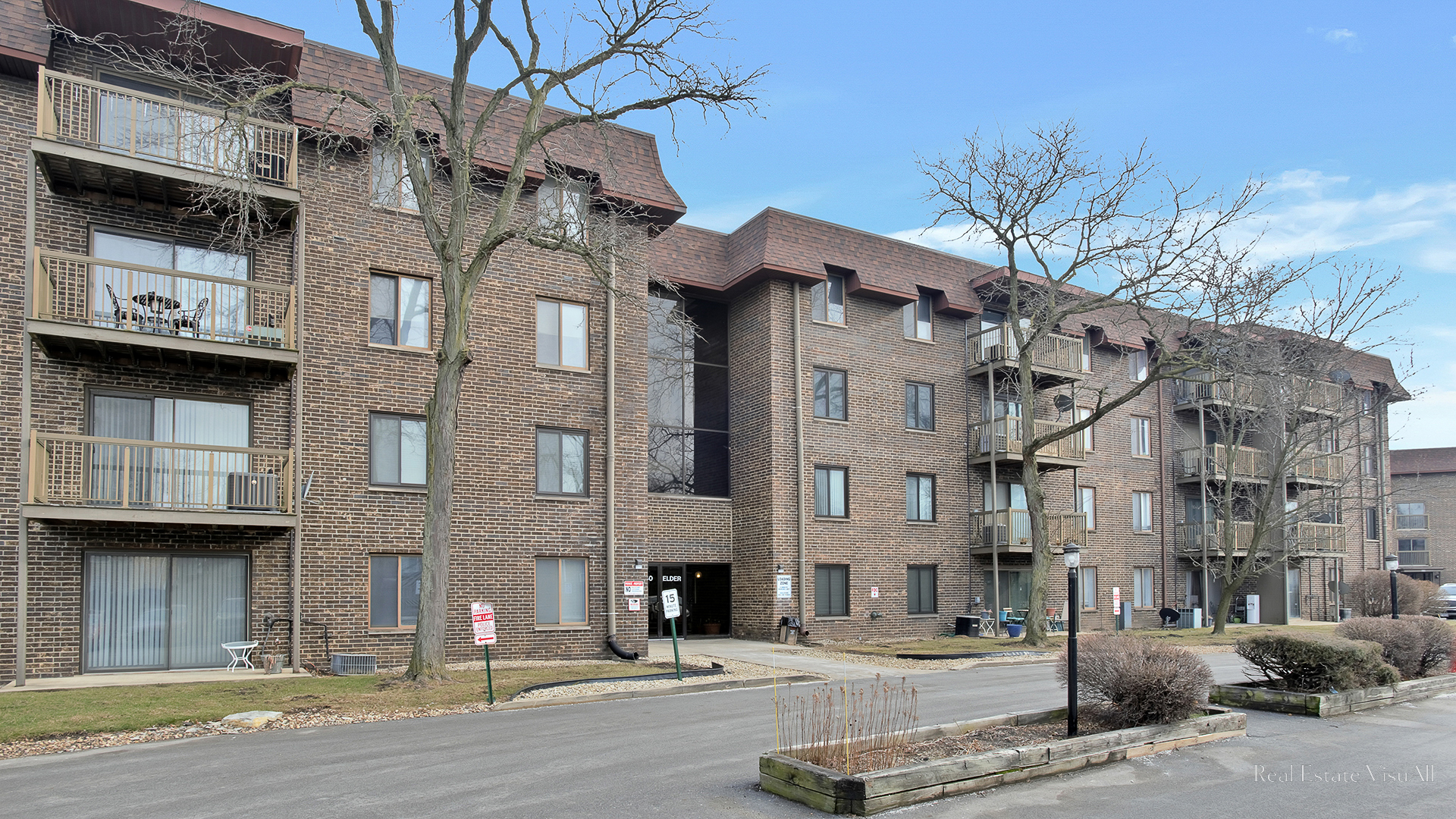 840 Elder Road, Unit A405 Homewood, IL 60430 - Photo 2 of 21 a view of a building with a street