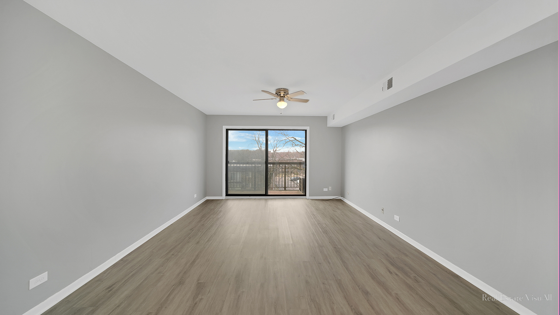 840 Elder Road, Unit A405 Homewood, IL 60430 - Photo 9 of 21 an empty room with wooden floor and windows