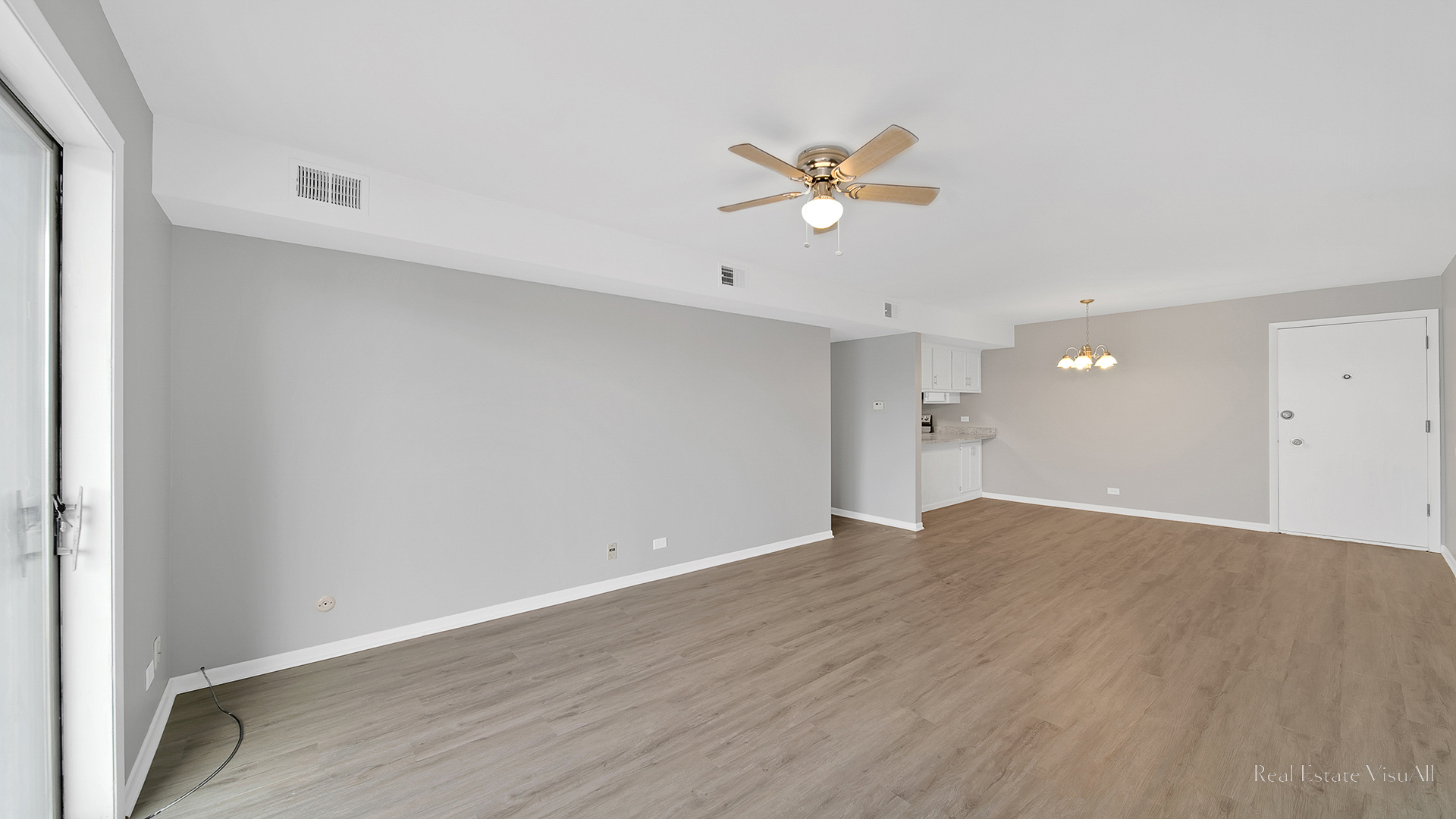 840 Elder Road, Unit A405 Homewood, IL 60430 - Photo 10 of 21 a view of empty room with wooden floor and ceiling fan