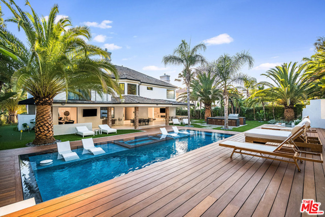 25879 Chalmers Place Calabasas, CA 91302 - Photo 26 of 38 a view of house with swimming pool and sitting area