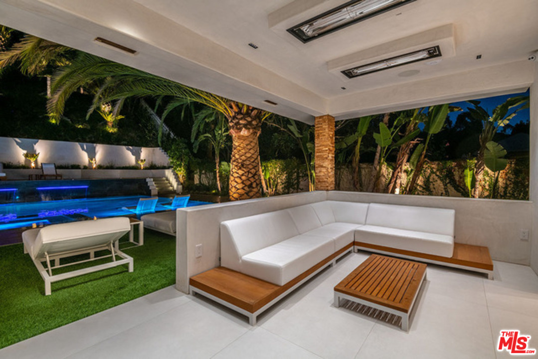 25879 Chalmers Place Calabasas, CA 91302 - Photo 29 of 38 a living room with furniture