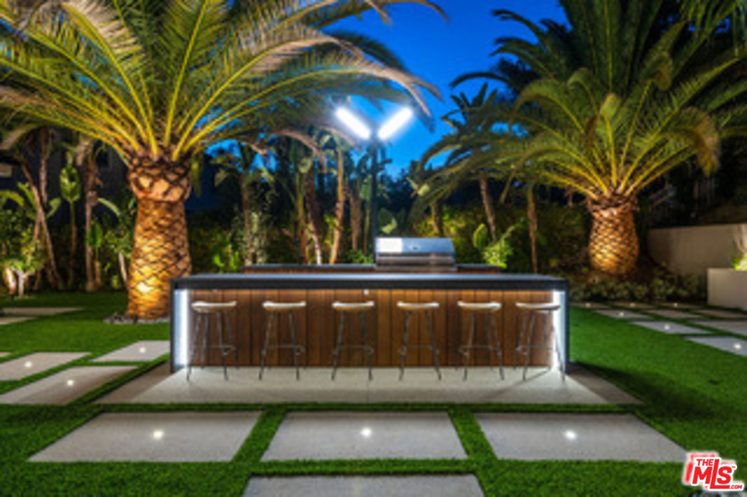 25879 Chalmers Place Calabasas, CA 91302 - Photo 32 of 38 a view of outdoor space with a garden