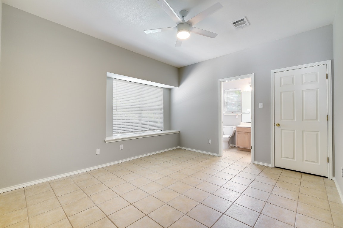 1504 East 19th Street Georgetown, TX 78626 - Photo 17 of 27 a view of an empty room with a window