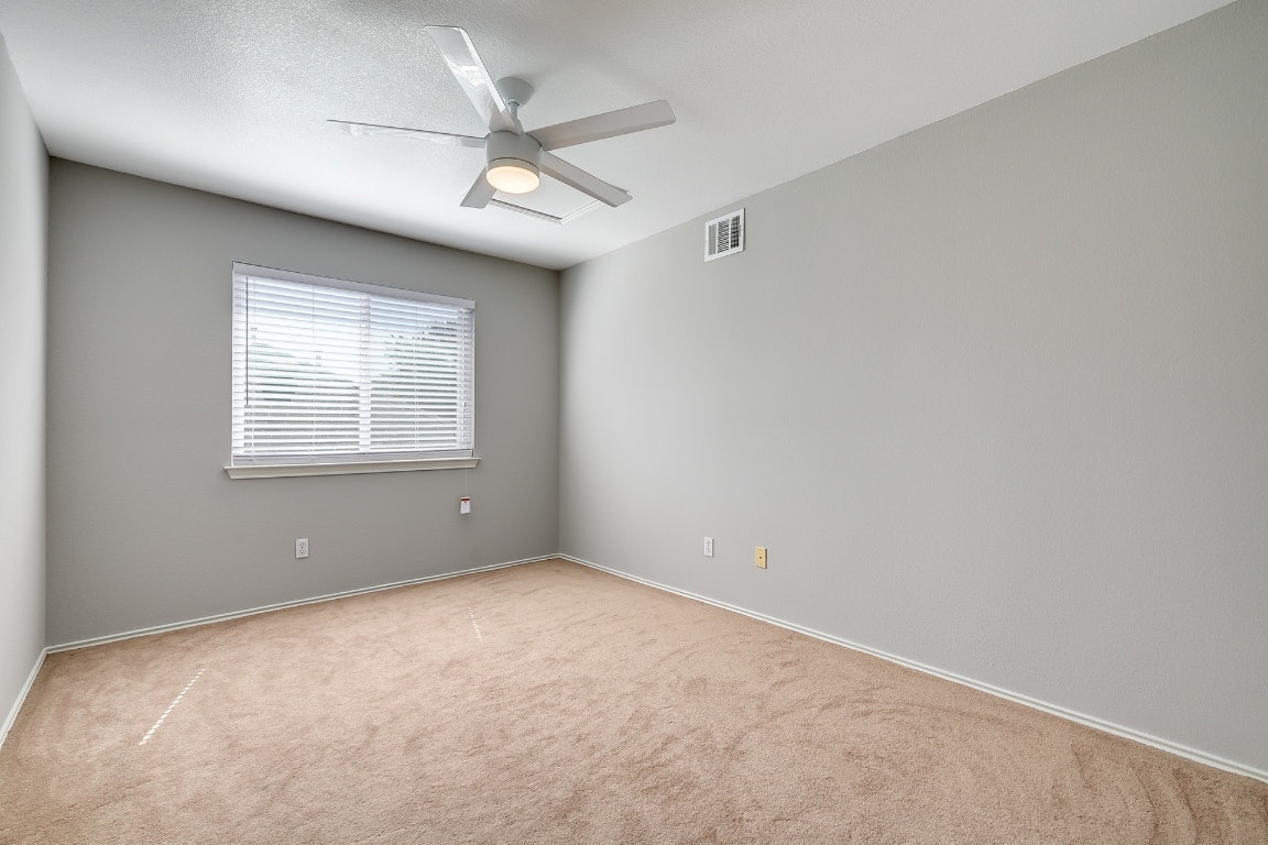 1504 East 19th Street Georgetown, TX 78626 - Photo 20 of 27 a view of an empty room with a window